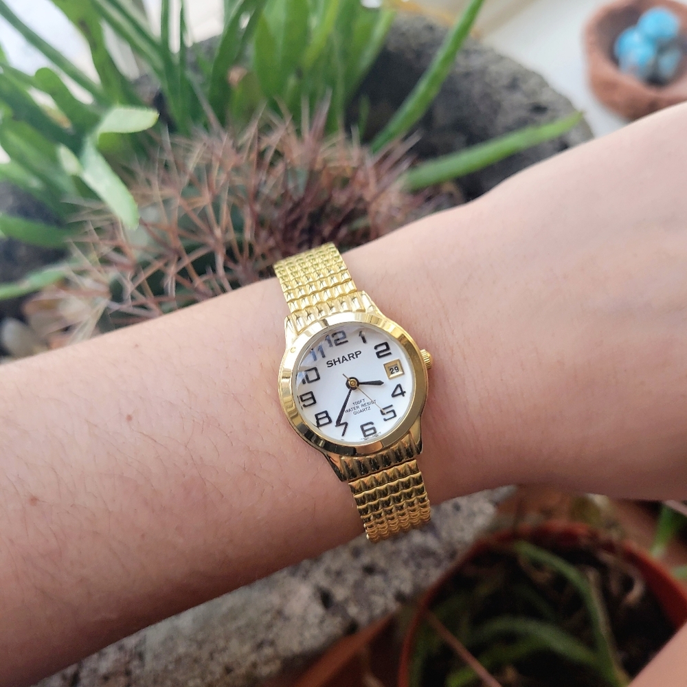 Sharp Gold Calendar Round Stretch Watch - Picture 2 of 10